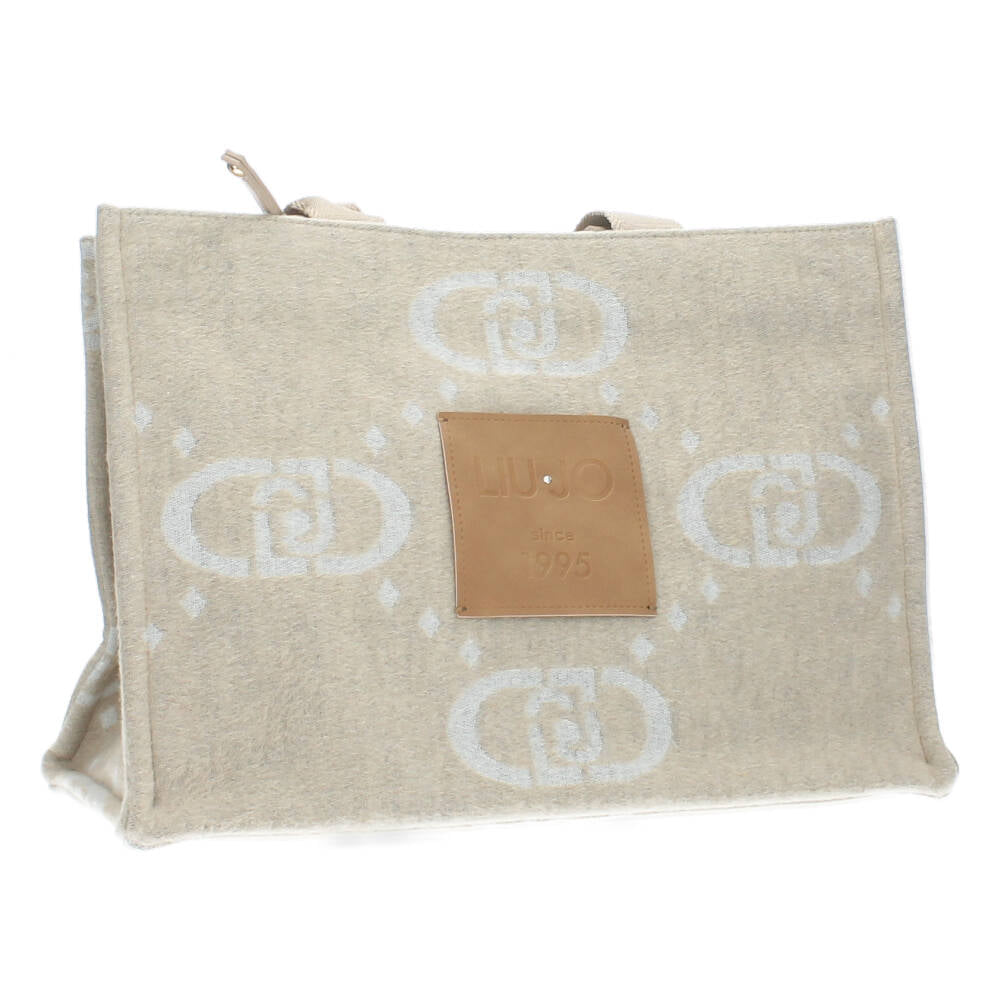 beige handtas