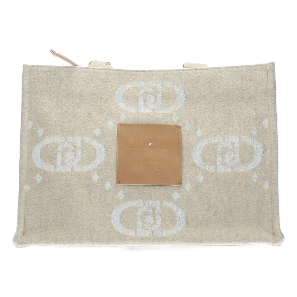 beige handtas