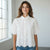 witte blouse