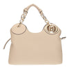 beige handtas