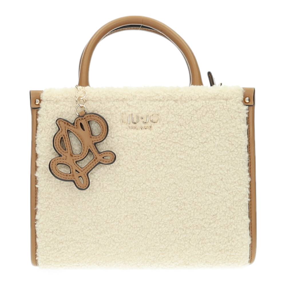 beige teddy handtas