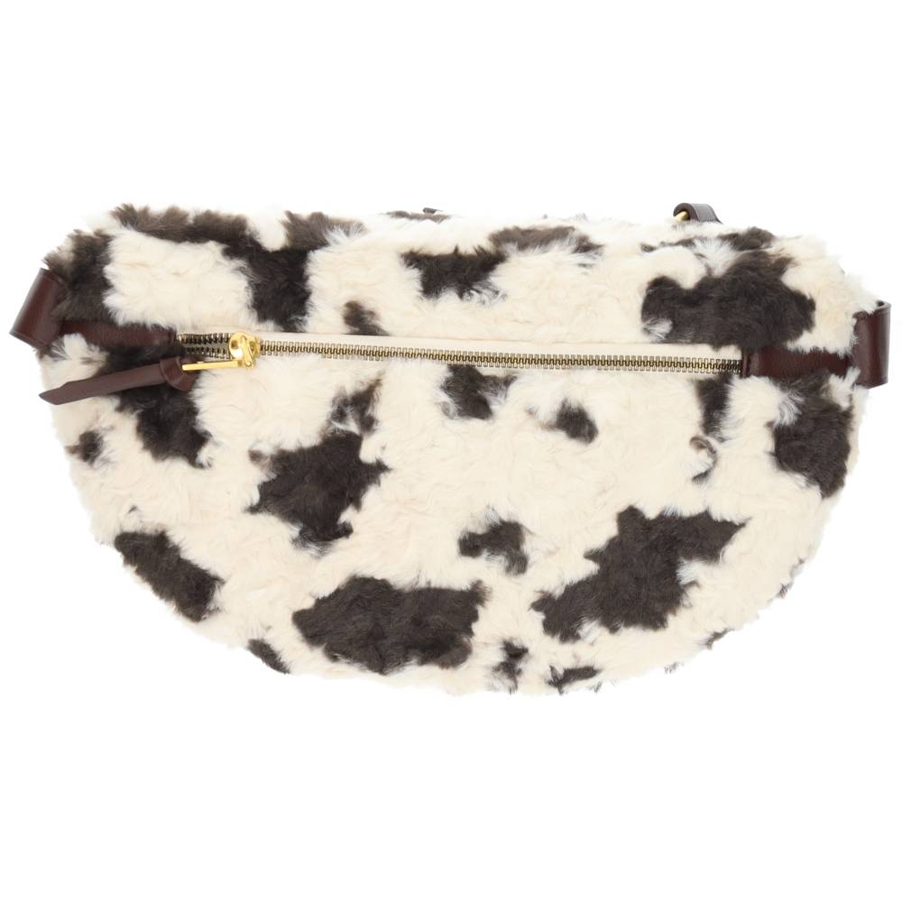 beige handtas met bruine vlekken