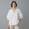 witte blouse