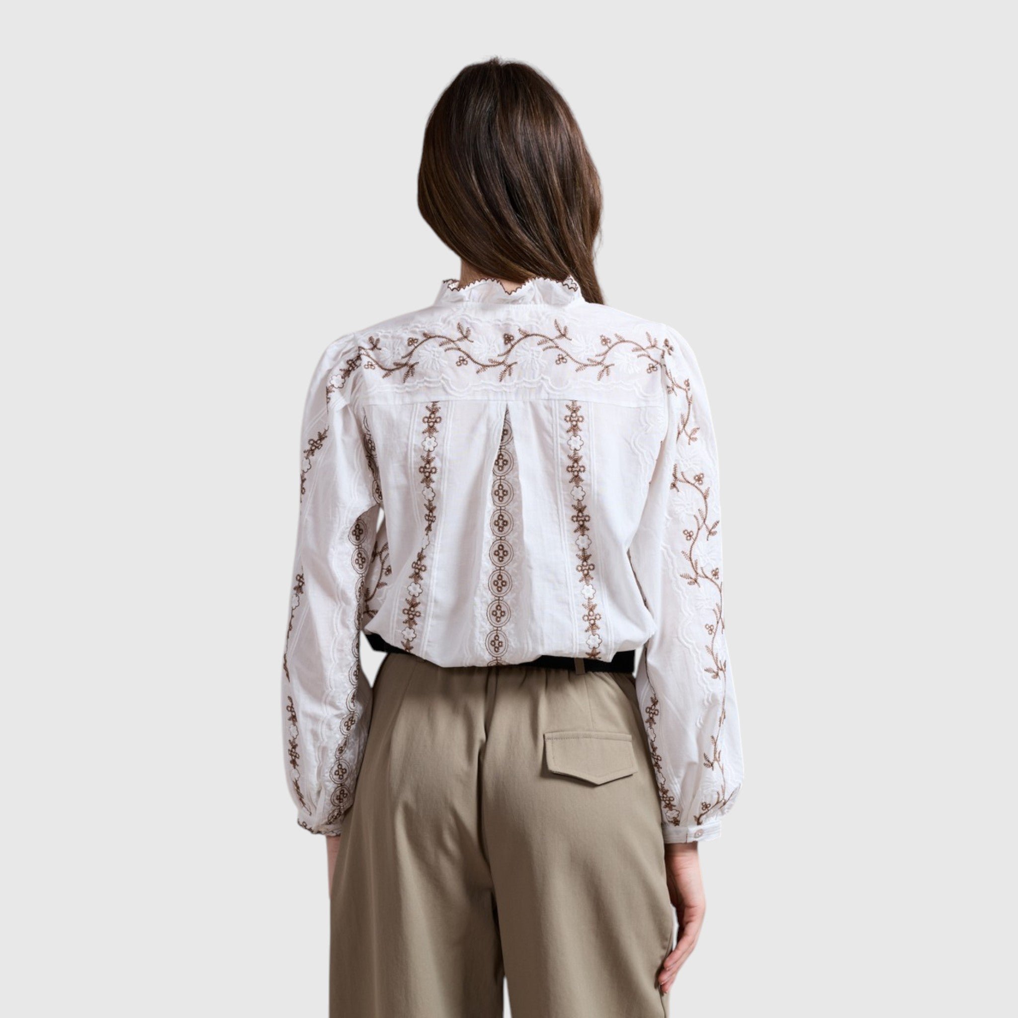 witte blouse